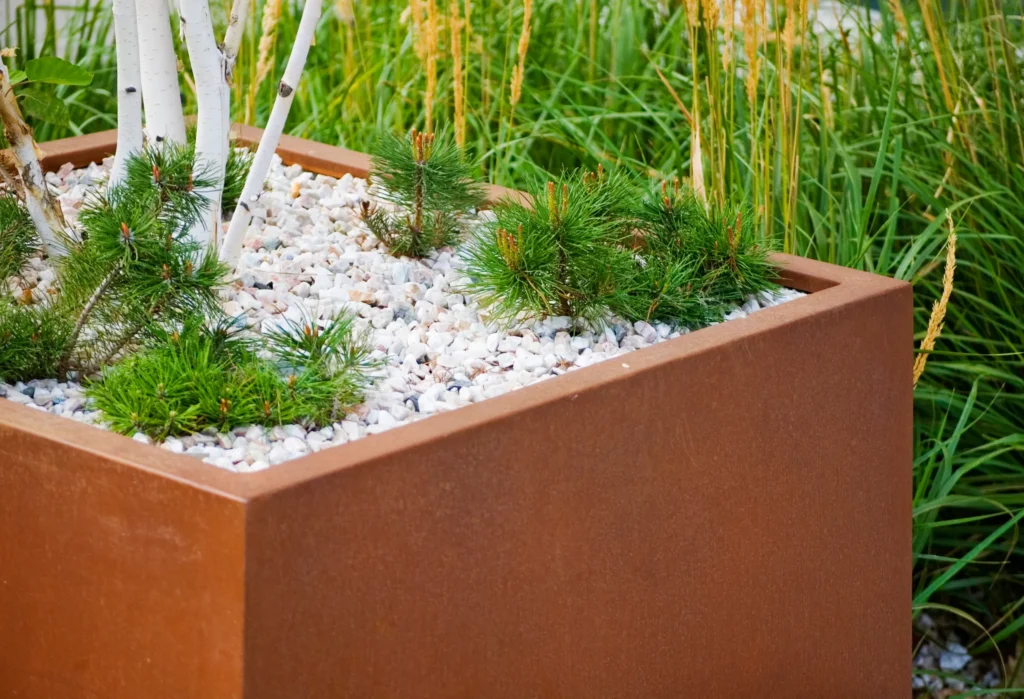 Cortenstalen maatwerk | Cortenstalen plantenbak | Cortenstaal in de tuin | Cortenstaal Vlaeminck Aarsele